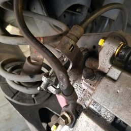 This is my brake fluid line that was rubbing away because the idiot named kyle installed them to close to my tires. This is my brake fluid line that was rubbing away because the idiot named kyle installed them to close to my tires.