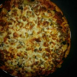 Pizza Plus - Our large is 17 inches and feeds four adults