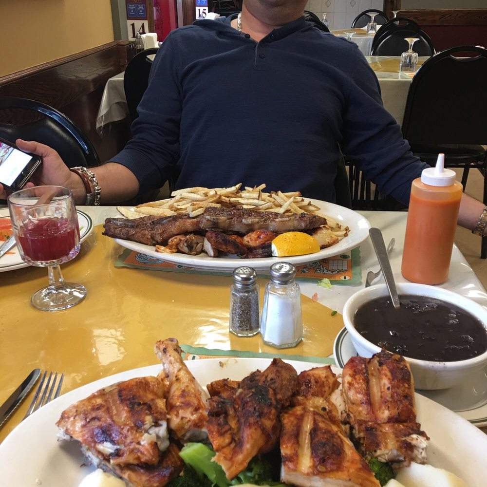 Picnic Portugese Barbecue - Brad with his chicken and short ribs - Barbeque Near Me - Newark, New Jersey Picnic Portugese Barbecue - Brad with his chicken and short ribs - Barbeque Near Me - Newark, New Jersey