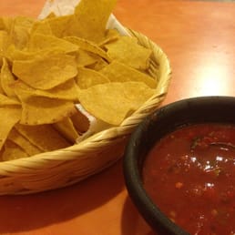 a bowl of chips and a bowl of salsa a bowl of chips and a bowl of salsa