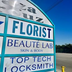 The Beauté Lab - Plaza sign
