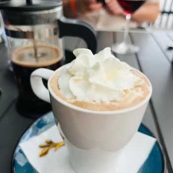 Bistro At Lake Chelan - a cup of coffee with whipped cream - American Near Me - Chelan, Washington Bistro At Lake Chelan - a cup of coffee with whipped cream - American Near Me - Chelan, Washington