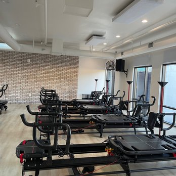 Bold - Back row. The machines are staggered so everyone can see themselves in the mirror - Pilates Near Me - Walnut Creek, California