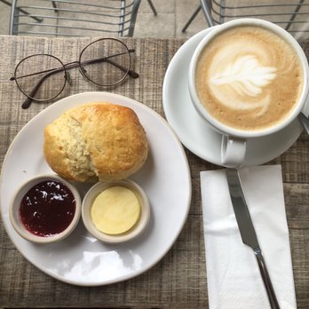 GAIL's Bakery - Bloomsbury - Scone with cream and jam, and a cup of cappuccino - Bakeries Near Me - London, XGL GAIL's Bakery - Bloomsbury - Scone with cream and jam, and a cup of cappuccino - Bakeries Near Me - London, XGL