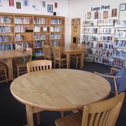 Fortuna Library - The study area with children's non-fiction, Large Type books, and audiobooks.