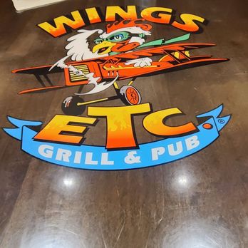 Wings Etc - Wings Etc Grill and Pub on each of the table tops. - Chicken Wings Near Me - Avon, Indiana