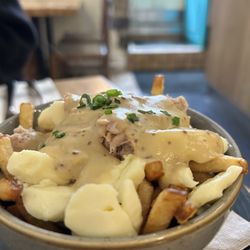 Le Lapin Sauté - Poutine with pulled rabbit