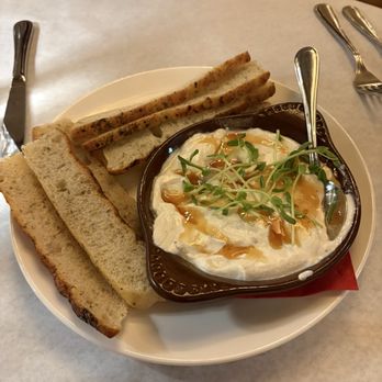 Casa Novello - Hot honey ricotta dip and house made focaccia - Italian Near Me - Westbrook, Maine Casa Novello - Hot honey ricotta dip and house made focaccia - Italian Near Me - Westbrook, Maine