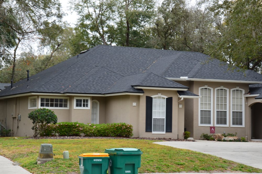 Slide of Roof Pros USA