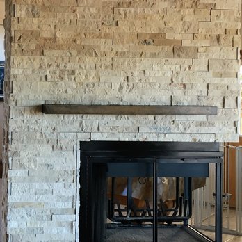 CJ & J Construction - Newly Tiled Fireplace - General Contractors Near Me