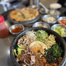 Tofu Plus - Dolsot bibimbap, seafood backpack and bonchon in the back