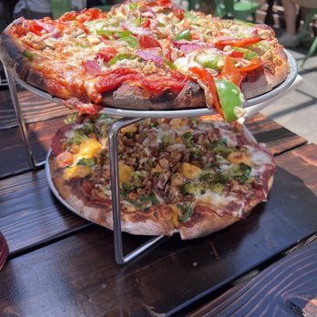 Wild Tomato - On top, the D-Lux and bottom is The Green & Gold. Both amazing!!! - Pizza Near Me - Fish Creek, Wisconsin Wild Tomato - On top, the D-Lux and bottom is The Green & Gold. Both amazing!!! - Pizza Near Me - Fish Creek, Wisconsin