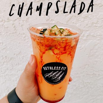 Ruthless Fit - a hand holding a cup of orange juice - Juice Bars & Smoothies Near Me - Lawndale, California Ruthless Fit - a hand holding a cup of orange juice - Juice Bars & Smoothies Near Me - Lawndale, California