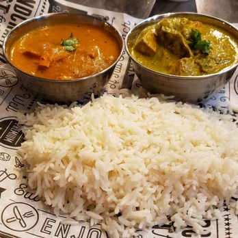 Tikka Tangy - "Thali" with butter chicken and the special chili paneer curry, with a generous portion of rice. - Indian Near Me - Chesterfield, Missouri Tikka Tangy - "Thali" with butter chicken and the special chili paneer curry, with a generous portion of rice. - Indian Near Me - Chesterfield, Missouri