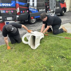 CJM Plumbing, Heating & AC - CJM plumbers working