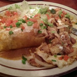 Nuevo México - Chicken fajita burrito comes with pico & guacamole & salsa :) filled with everything else