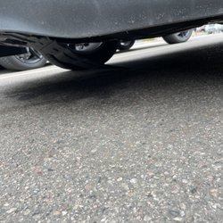 Jiffy Lube - Guard hanging down with no screws