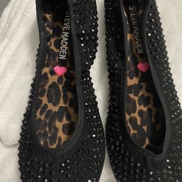 Very classy lil black shoes for a young girl. Very classy lil black shoes for a young girl.
