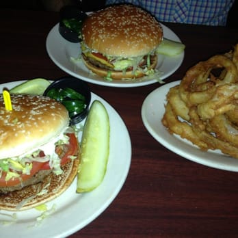 Redcoat Tavern - Burgers and onion rings. The extra ingredients like jalapeños came on the side, not inside the burgers. - Bars Near Me - Royal Oak, Michigan Redcoat Tavern - Burgers and onion rings. The extra ingredients like jalapeños came on the side, not inside the burgers. - Bars Near Me - Royal Oak, Michigan
