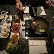 Photo of The Melting Pot - Buffalo, NY, United States. Court Bouillon broth with Big Night Out