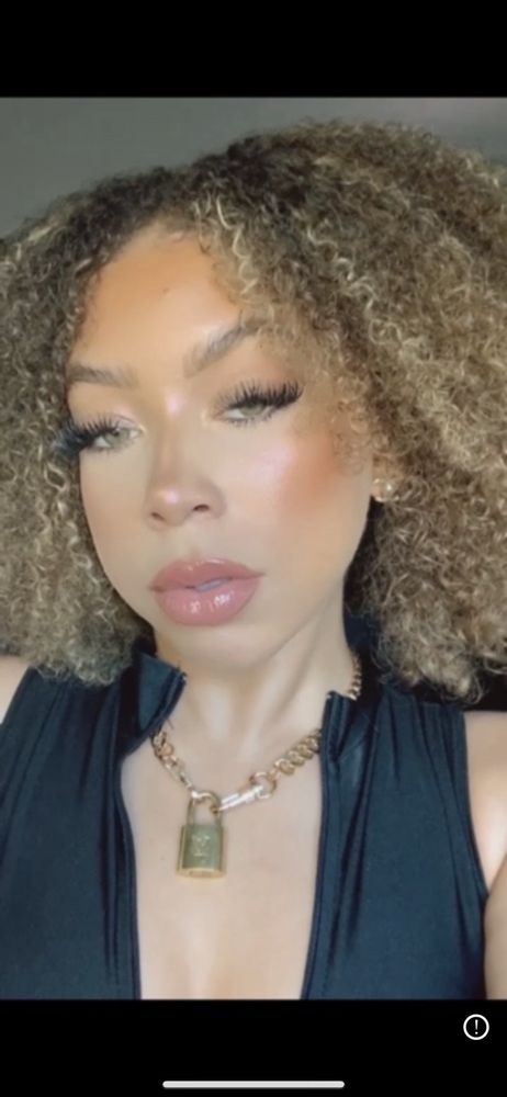 Truso's Hair Design Logo