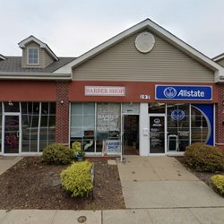 Creative Express Barber Shop - Barber shop is located next to Allstate.