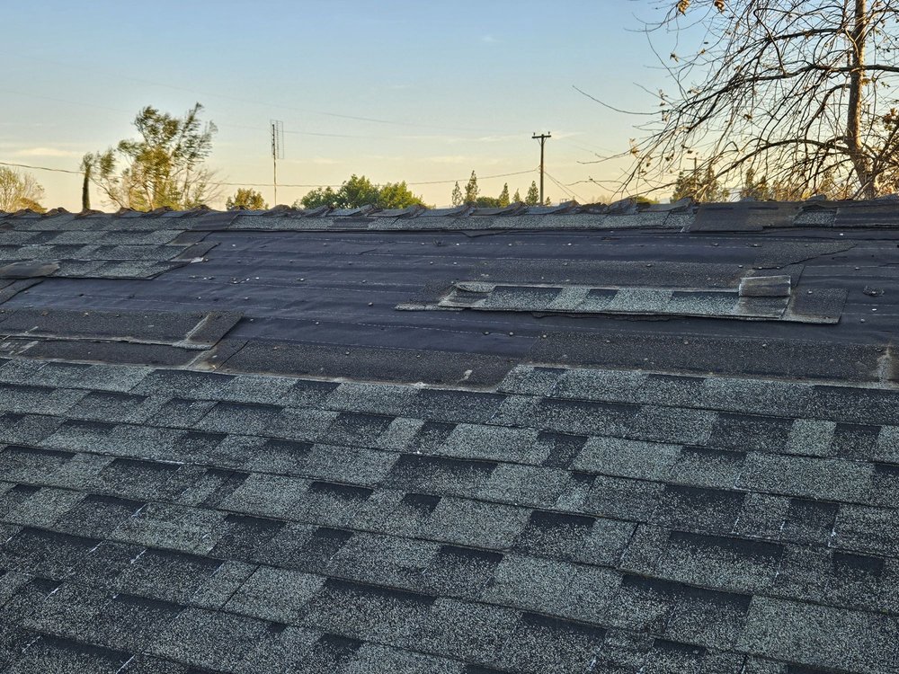Slide of Spikes Roofing