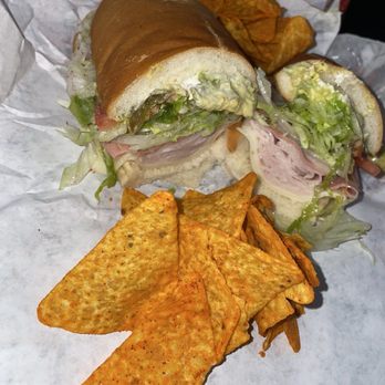 Jersey Mike's Subs - Meat is fully stacked, the vinegar dressing is a little strong. But it gives the sandwich a kick. & some Nacho Cheese Doritos. - Fast Food Near Me - Los Angeles, California