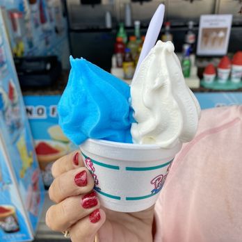Polish Water Ice - a woman holding a cup of ice cream - Shaved Ice Near Me - Ocean City, Maryland Polish Water Ice - a woman holding a cup of ice cream - Shaved Ice Near Me - Ocean City, Maryland