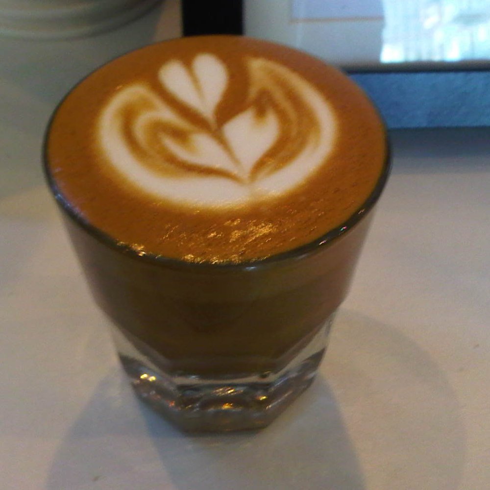 Fahrenheit Coffee - a beautiful cortado flower - Coffee & Tea Near Me - Toronto, Ontario Fahrenheit Coffee - a beautiful cortado flower - Coffee & Tea Near Me - Toronto, Ontario