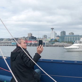 Sailing Seattle - Uncle taking pictures of the beautiful Seattle view. - Boat Charters Near Me - Seattle, Washington Sailing Seattle - Uncle taking pictures of the beautiful Seattle view. - Boat Charters Near Me - Seattle, Washington