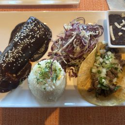 Combo #1 (chicken mole enchilada and carne asada taco) with black beans - fantastico! Combo #1 (chicken mole enchilada and carne asada taco) with black beans - fantastico!