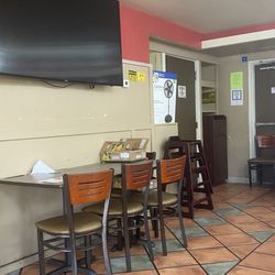 Ruchi Indian Restaurant - Dirty walls, cardboard boxes, a random eating area. Who does this?