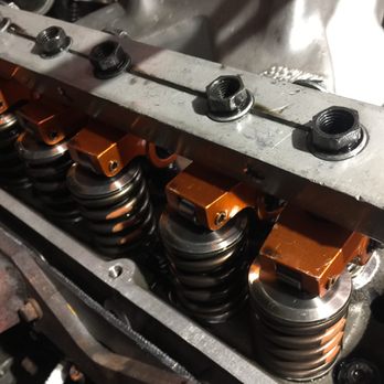 OutKast Garage - Replacing the valve cover gaskets on an small block Chevy motor while checking for proper valve clearance. - Auto Repair Near Me - Orange Park, Florida OutKast Garage - Replacing the valve cover gaskets on an small block Chevy motor while checking for proper valve clearance. - Auto Repair Near Me - Orange Park, Florida