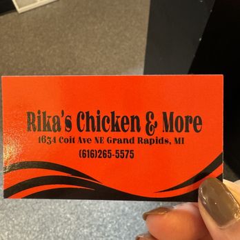 Rika's Chicken & More - a person holding a business card - Chicken Wings Near Me - Grand Rapids , Michigan Rika's Chicken & More - a person holding a business card - Chicken Wings Near Me - Grand Rapids , Michigan