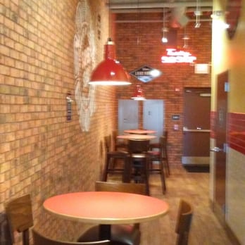 Jimmy John's - a dining area with a table and chairs - Sandwiches Near Me - Bridgeville, Pennsylvania