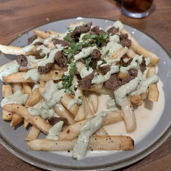 The Golden Rule - Carne asada queso fries - Cocktail Bars Near Me - Georgetown, Texas The Golden Rule - Carne asada queso fries - Cocktail Bars Near Me - Georgetown, Texas