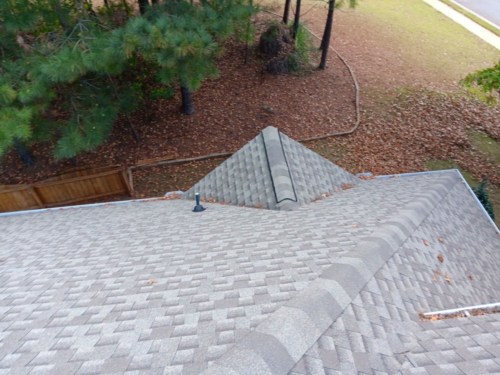 Slide of Drain rite gutter cleaning