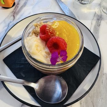 The Eleanor Room - Chocolate chia pudding dessert with puréed mango, raspberries and coconut crunch. - Diners Near Me - Greendale, Wisconsin The Eleanor Room - Chocolate chia pudding dessert with puréed mango, raspberries and coconut crunch. - Diners Near Me - Greendale, Wisconsin