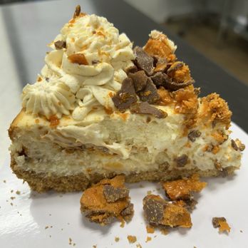 Susan's Sweets - Butterfinger cheesecake - Desserts Near Me - Fort Oglethorpe, Georgia Susan's Sweets - Butterfinger cheesecake - Desserts Near Me - Fort Oglethorpe, Georgia