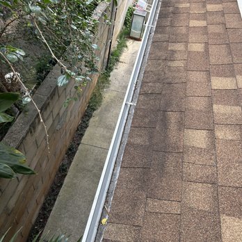 Aloha Cleaning Exterior Services - Post picture of gutter cleaning with some build up of dirt, grime and shingle debris. Now the water is flowing with ease and no build up. - Solar Panel Cleaning Near Me Aloha Cleaning Exterior Services - Post picture of gutter cleaning with some build up of dirt, grime and shingle debris. Now the water is flowing with ease and no build up. - Solar Panel Cleaning Near Me