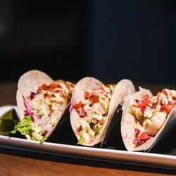 SKYBOKX 109 Sports Bar & Grill - Fish Tacos-Three flour tortillas, pan seared cod, shredded lettuce, pico de gallo, slaw, cilantro lime aioli