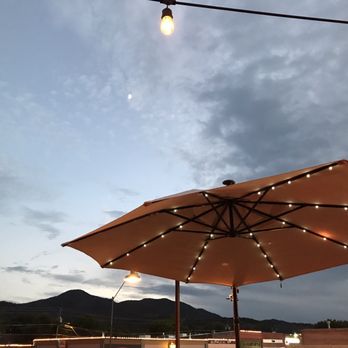Station 66 - Outside seating with a view of mountains. - Bars Near Me - Williams, Arizona Station 66 - Outside seating with a view of mountains. - Bars Near Me - Williams, Arizona