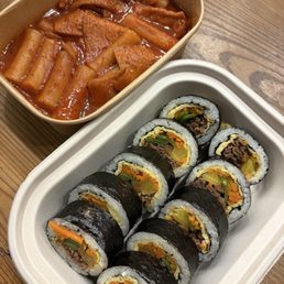 Tteokbokki (spicy rice cakes) and bulgogi kimbap Tteokbokki (spicy rice cakes) and bulgogi kimbap