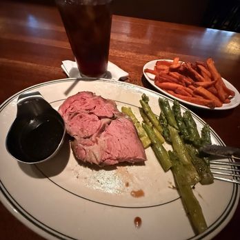 Village Tavern - 8oz. Prime Rib with Au Jus Grilled Asparagus Sweet Potato fries - New American Near Me - Birmingham, Alabama Village Tavern - 8oz. Prime Rib with Au Jus Grilled Asparagus Sweet Potato fries - New American Near Me - Birmingham, Alabama