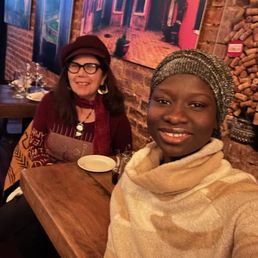 Joni D and Fatima F enjoying a birthday/holiday dinner at Crispin's. Joni D and Fatima F enjoying a birthday/holiday dinner at Crispin's.