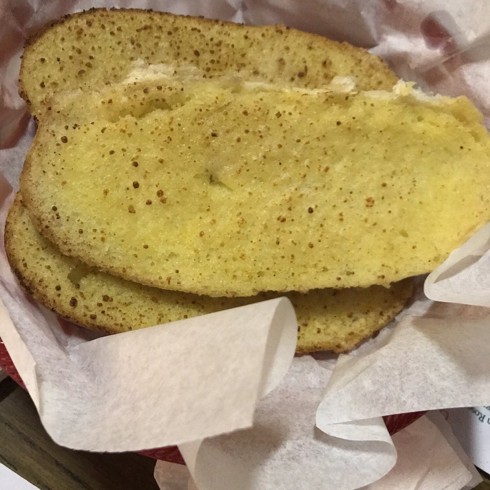 Vince's Spaghetti - Cheese bread on top, and garlic bread on the bottom! - Italian Near Me - Ontario, California Vince's Spaghetti - Cheese bread on top, and garlic bread on the bottom! - Italian Near Me - Ontario, California