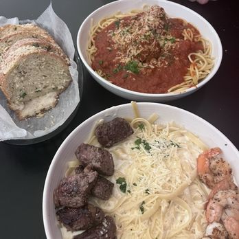 Abruzzo's - Spaghetti and meatballs and surf and turf fettuccine Alfredo - Salad Near Me - Corydon, Indiana