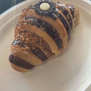 L’Boulanger - Nutella croissant  with dark & white chocolate flower - French Near Me - Miami, Florida