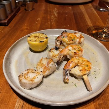Stripsteak - scallops + shrimps added $17 but they were over cooked and replaced. see next photo. - Steakhouses Near Me - Las Vegas, Nevada Stripsteak - scallops + shrimps added $17 but they were over cooked and replaced. see next photo. - Steakhouses Near Me - Las Vegas, Nevada